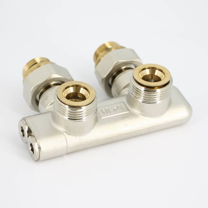 Узел радиаторный перекрестный угловой Uni-Fitt НВ 3/4 x 3/4 EK с ниппелями и адаптером 197N3011