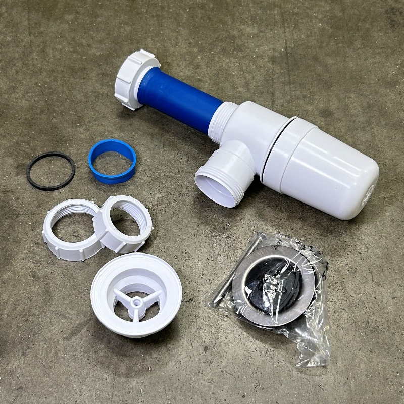 Сифон бутылочный 1 1/2 х 32 мм с вып. 70 мм и пробкой, выход 40 мм компрес.